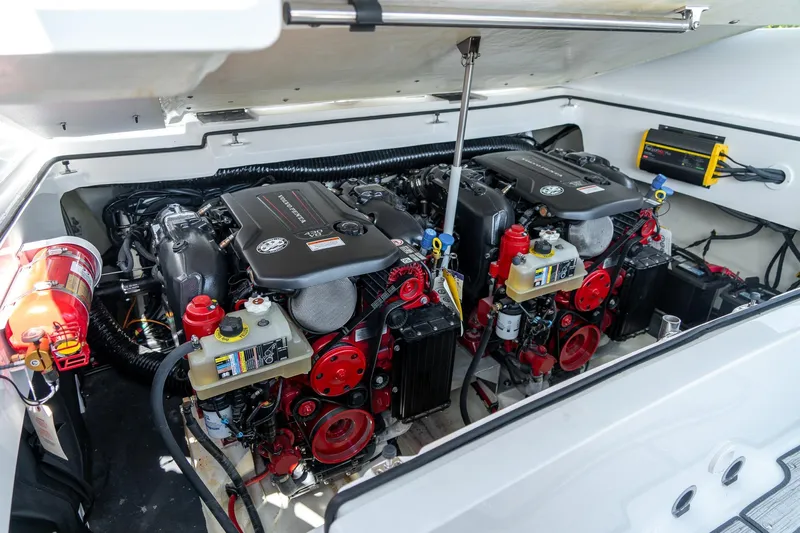  Yacht Photos Pics Engine compartment of 2023 Cobalt R30 boat with dual engines and fire extinguisher.