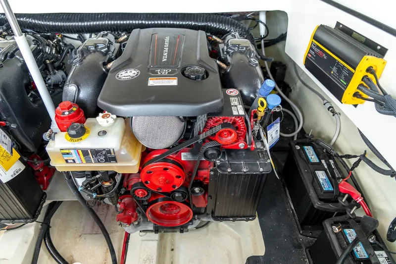  Yacht Photos Pics 2023 Cobalt R30 engine compartment with Volvo Penta motor and battery setup.