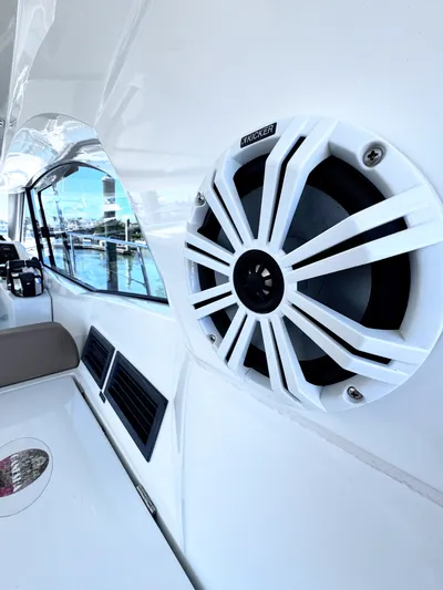 Ganesha Yacht Photos Pics Close-up of a 2016 Jeanneau 36 Leader boat interior with a Kicker speaker.