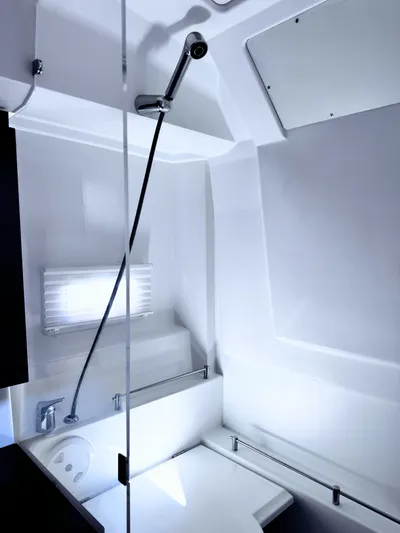 Ganesha Yacht Photos Pics Modern bathroom interior of 2016 Jeanneau 36 Leader yacht, featuring sleek design and fixtures.