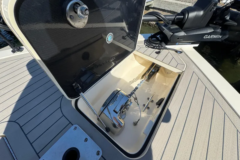  Yacht Photos Pics Open anchor compartment on 2025 Scout 281 XSS boat with Garmin equipment.