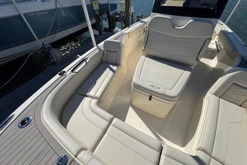  Yacht Photos Pics 2025 Scout 281 XSS boat interior with luxurious seating and modern design.