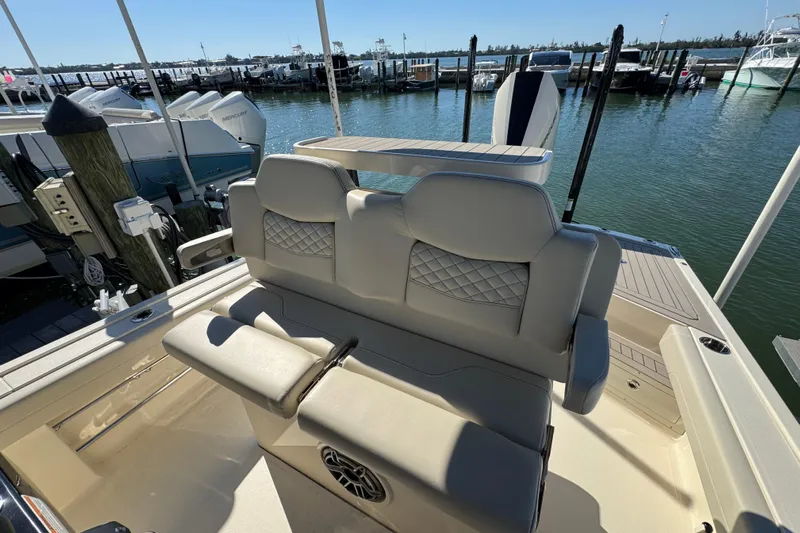  Yacht Photos Pics Luxury seating on 2025 Scout 281 XSS boat docked at marina.
