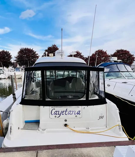 Cayetana Yacht Photos Pics 2004 Sea Ray 390 Sundancer docked at marina with clear skies.