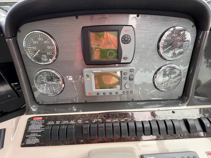 Cayetana Yacht Photos Pics Dashboard of 2004 Sea Ray 390 Sundancer with gauges and navigation equipment.