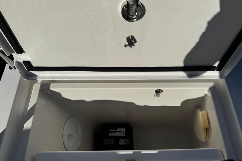  Yacht Photos Pics Open storage compartment on 2017 Axopar 37 Sun Top boat.