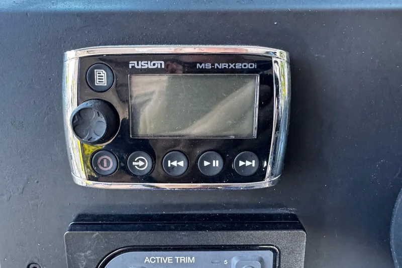  Yacht Photos Pics Fusion MS-NRX200i marine stereo on 2017 Axopar 37 Sun Top dashboard.