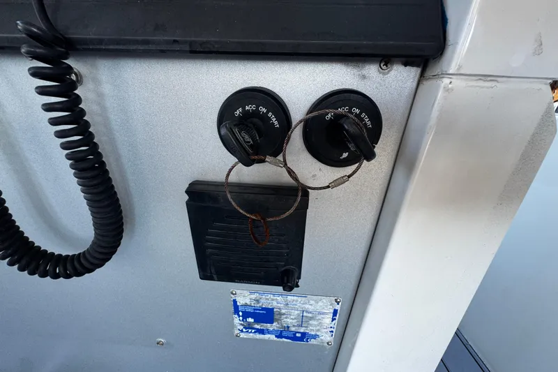  Yacht Photos Pics Control panel of a 2017 Axopar 37 Sun Top boat with ignition switches.