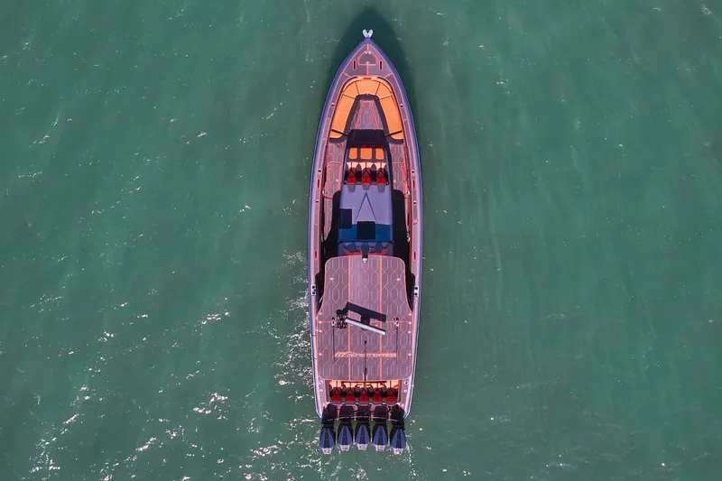  Yacht Photos Pics Aerial view of 2024 Midnight Express 43' Solstice yacht on open water.