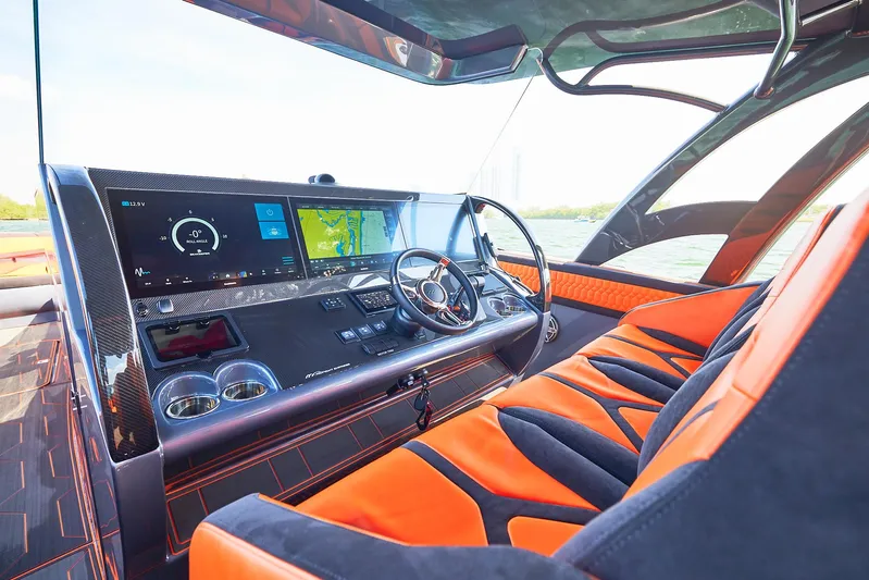  Yacht Photos Pics 2024 Midnight Express 43' Solstice boat interior with modern dashboard and vibrant seating.