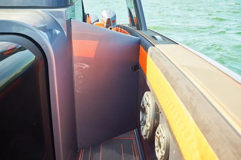  Yacht Photos Pics 2024 Midnight Express 43' Solstice boat interior with open door and speakers.