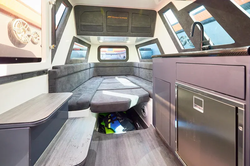  Yacht Photos Pics Interior of 2024 Midnight Express 43' Solstice boat, featuring modern seating and kitchenette.