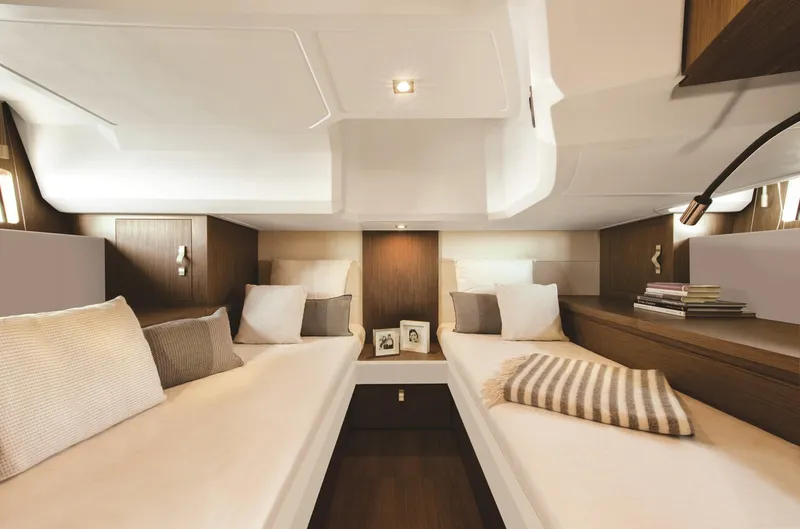  Yacht Photos Pics Interior cabin of 2019 Beneteau 40 yacht with twin beds and modern decor.