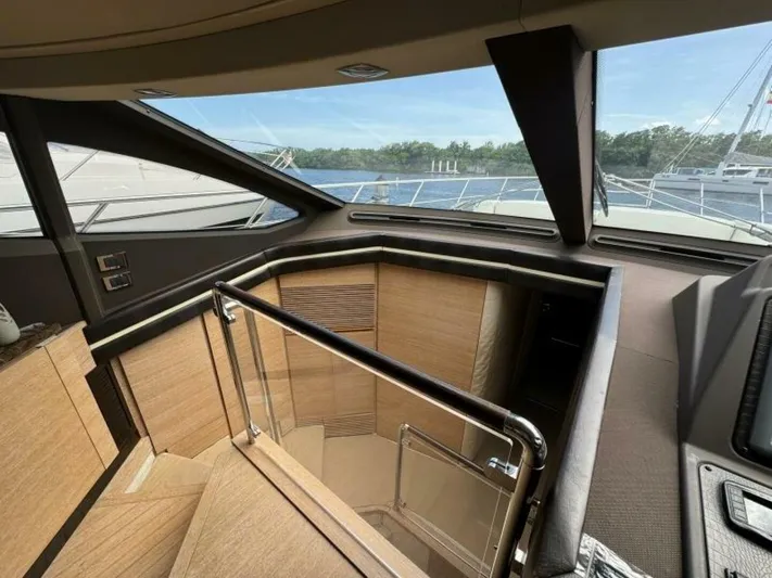 Odyssey Yacht Photos Pics Interior staircase of 2013 Azimut 64 Fly yacht with modern design and panoramic windows.
