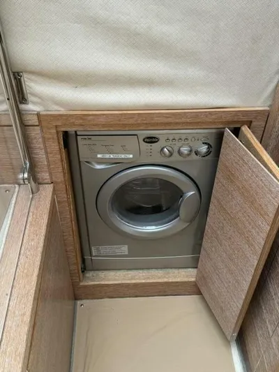 Odyssey Yacht Photos Pics Built-in washing machine on 2013 Azimut 64 Fly yacht.