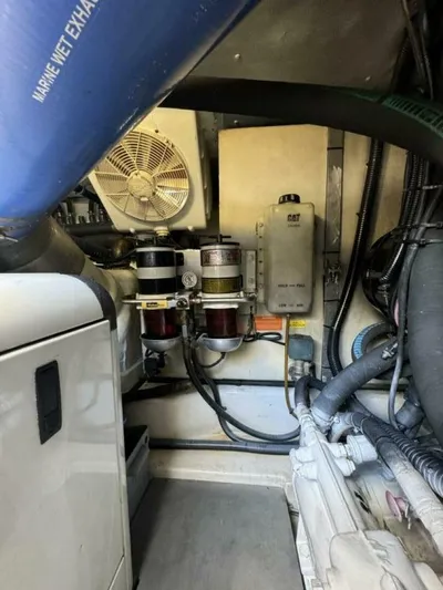 Odyssey Yacht Photos Pics Engine room of a 2013 Azimut 64 Fly yacht showing mechanical components.