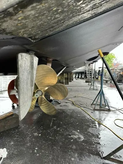 Odyssey Yacht Photos Pics 2013 Azimut 64 Fly yacht under maintenance, showing propeller and rudder.