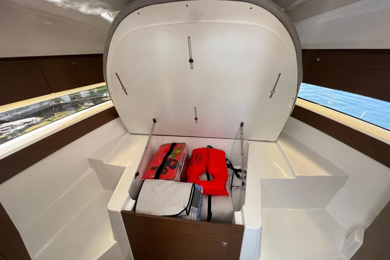  Yacht Photos Pics Interior storage of 2018 Jeanneau NC 895 boat with life jackets and gear.