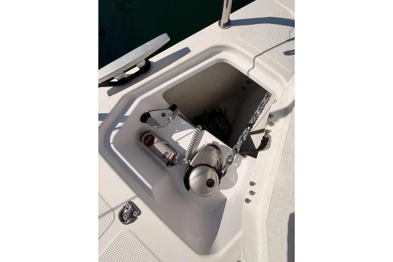 First 36 Yacht Photos Pics Anchor locker of 2023 Beneteau First 36 sailboat with chain and winch.