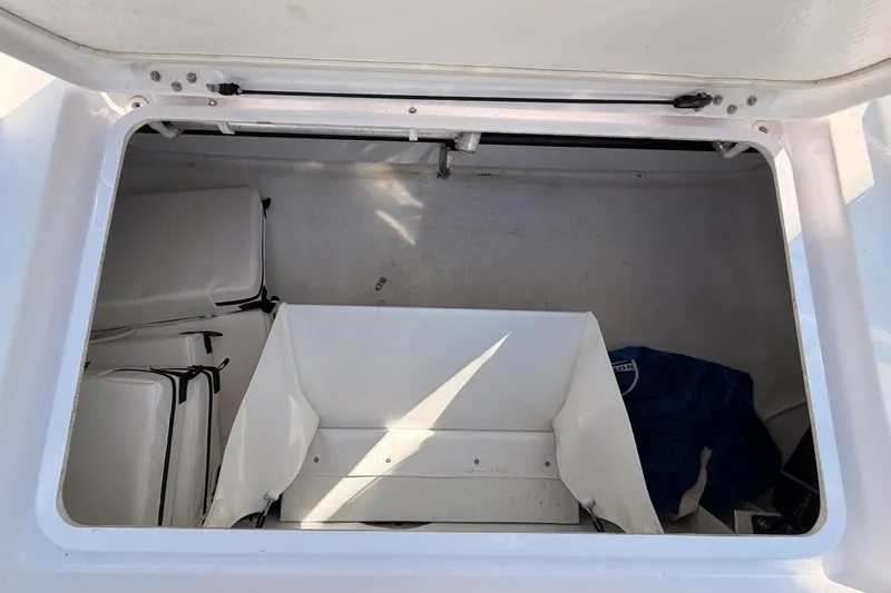 First 36 Yacht Photos Pics Storage compartment of 2023 Beneteau First 36 sailboat, featuring organized interior space.