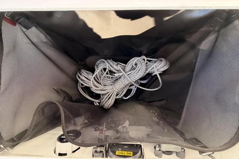 First 36 Yacht Photos Pics Storage compartment with rope in 2023 Beneteau First 36 sailboat.