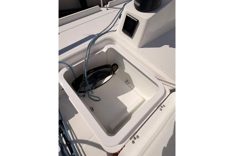 First 36 Yacht Photos Pics Open storage compartment on 2023 Beneteau First 36 sailboat deck.