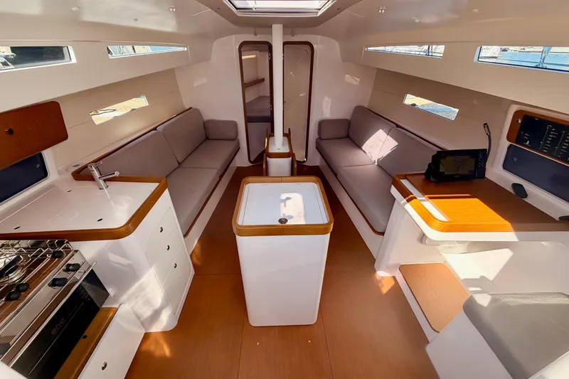 First 36 Yacht Photos Pics Interior of 2023 Beneteau First 36 yacht, featuring modern design and spacious seating.