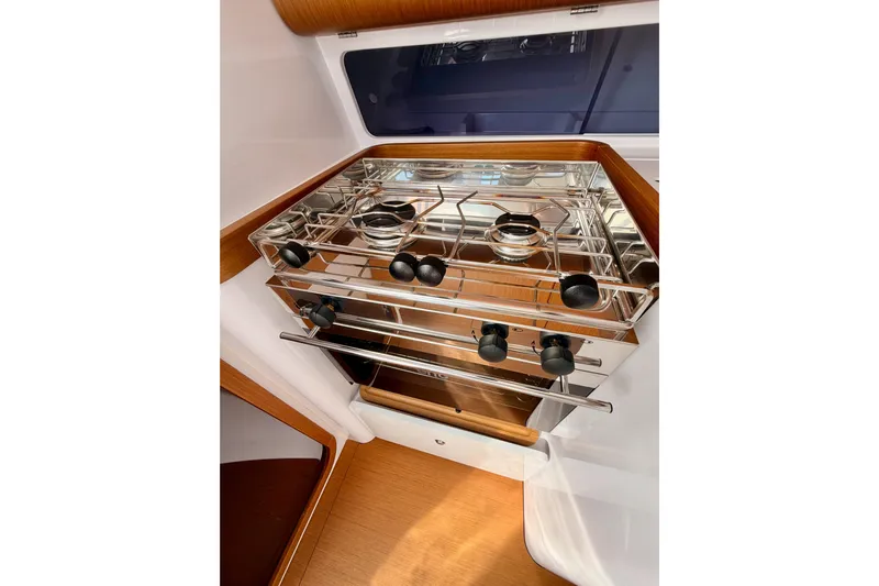 First 36 Yacht Photos Pics Modern kitchen area in 2023 Beneteau First 36 yacht with stainless steel stove.