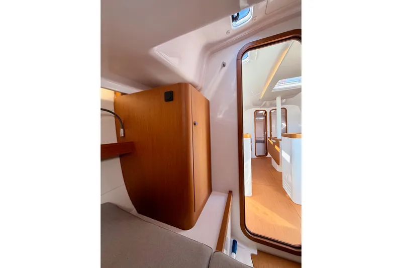 First 36 Yacht Photos Pics Interior of 2023 Beneteau First 36 sailboat, featuring modern wood finishes and sleek design.