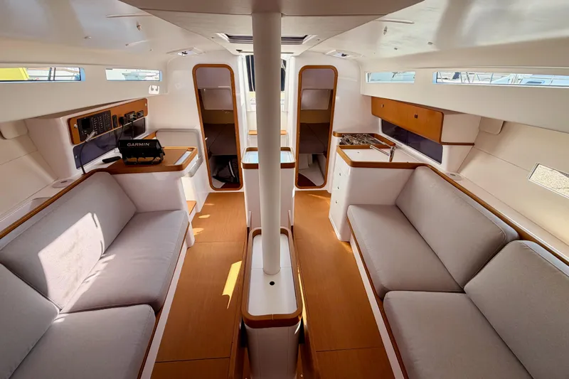 First 36 Yacht Photos Pics Interior of 2023 Beneteau First 36 sailboat, featuring modern design and comfortable seating.