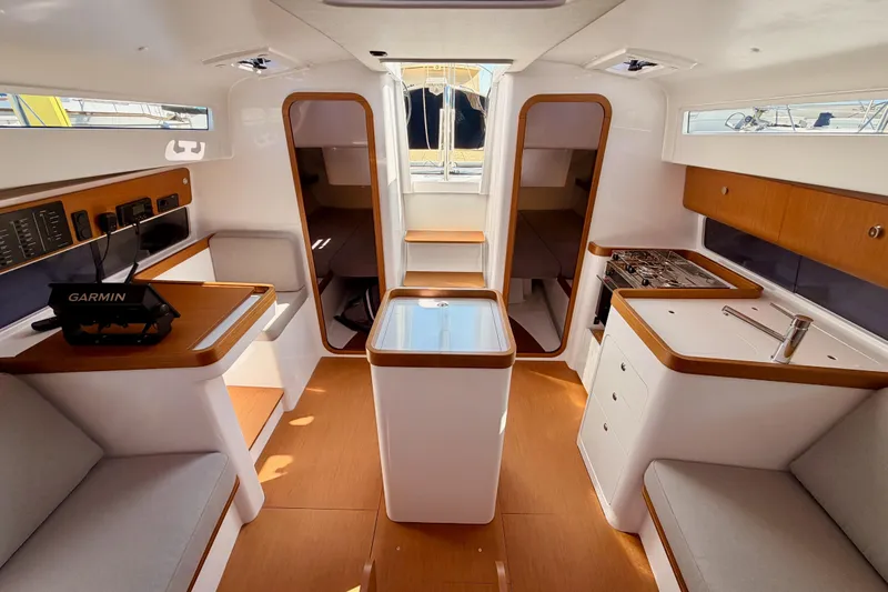 First 36 Yacht Photos Pics Interior of 2023 Beneteau First 36 sailboat, featuring modern design and navigation equipment.