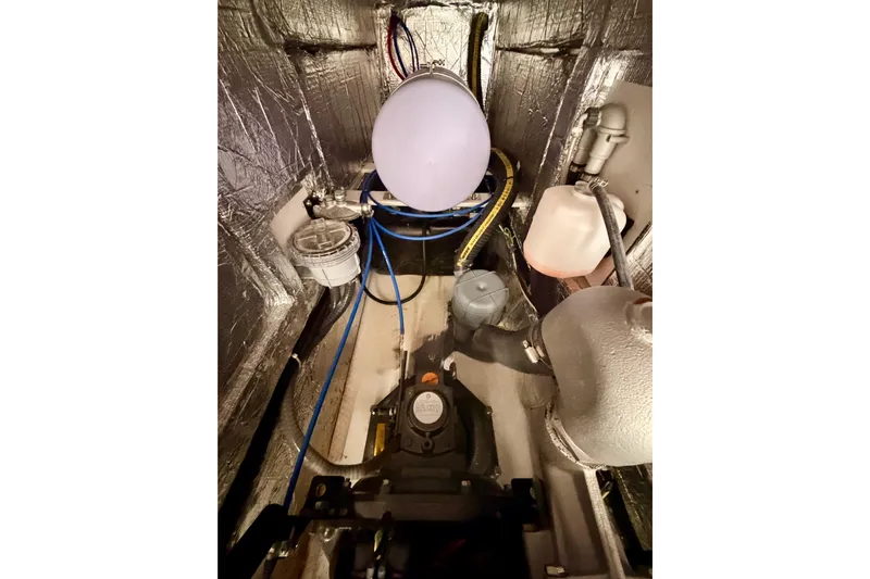 First 36 Yacht Photos Pics Engine compartment of 2023 Beneteau First 36 sailboat, showcasing mechanical components.