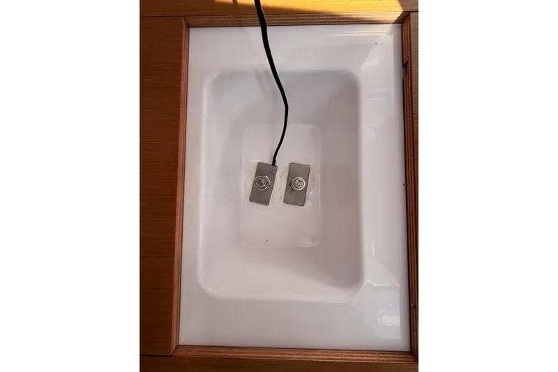 First 36 Yacht Photos Pics Interior detail of 2023 Beneteau First 36 yacht, featuring a recessed compartment with wiring.