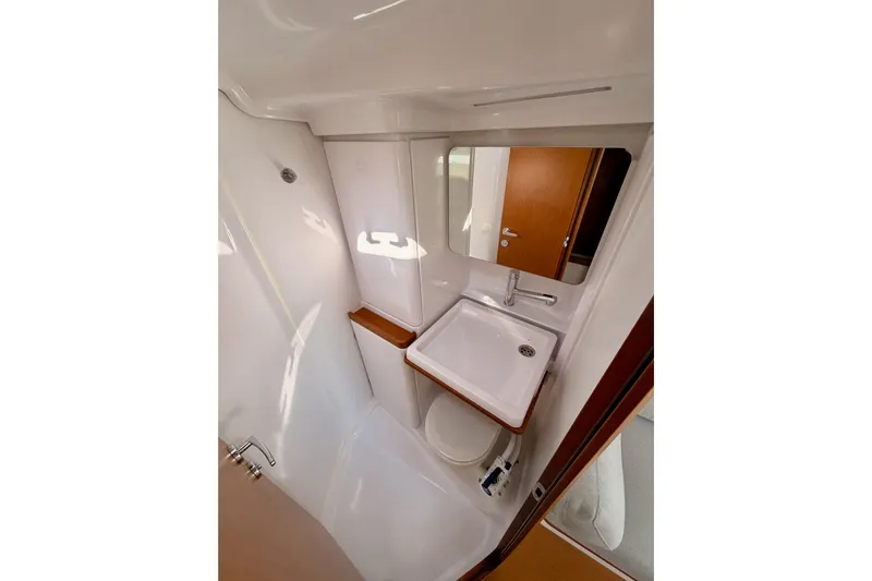 First 36 Yacht Photos Pics 2023 Beneteau First 36 yacht bathroom with modern sink and mirror.