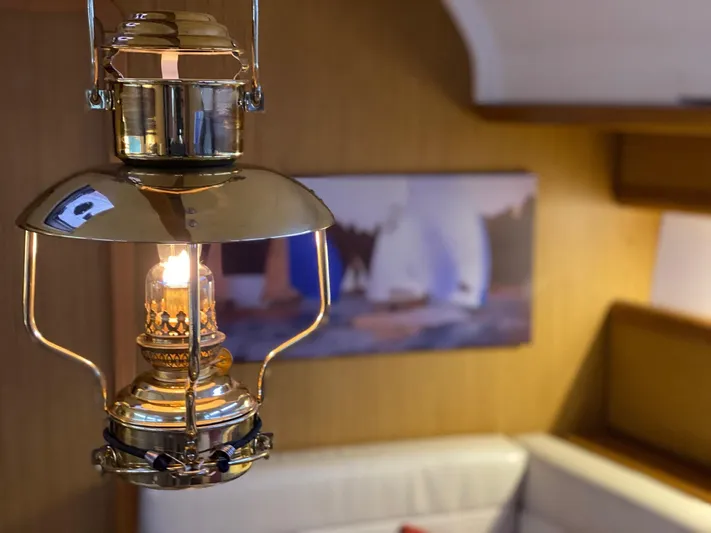 Flyer Yacht Photos Pics Brass lamp inside Jeanneau Sun Odyssey 44i, 2010 model.