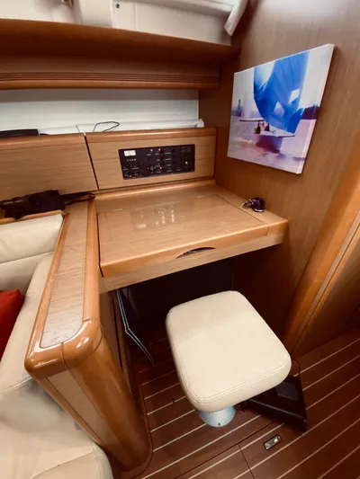 Flyer Yacht Photos Pics Interior of 2010 Jeanneau Sun Odyssey 44i with wooden furnishings.