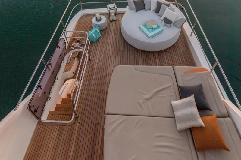  Yacht Photos Pics Luxurious 2016 Princess 82 yacht deck with elegant seating and cushions.