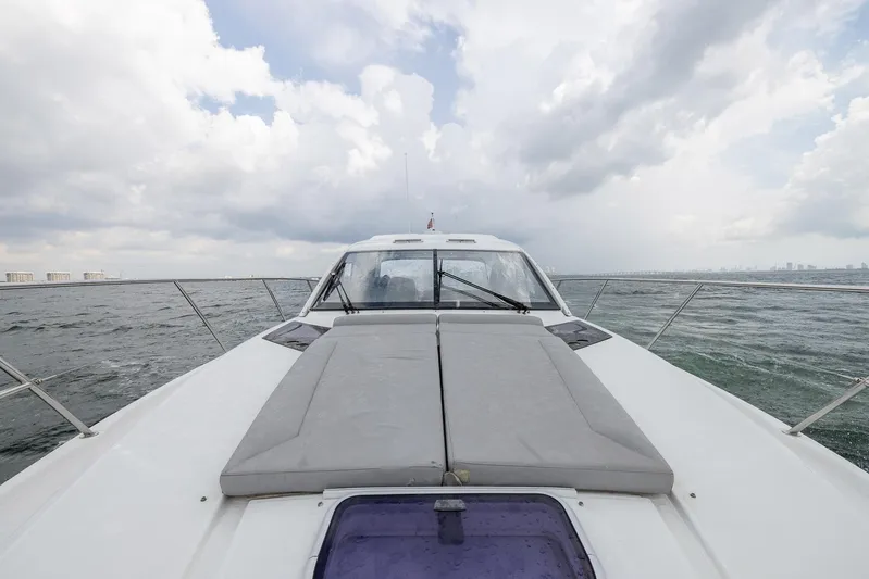 Perseverance Yacht Photos Pics 2014 Beneteau Gran Turismo 44 yacht cruising on open water under cloudy skies.