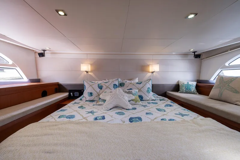Perseverance Yacht Photos Pics Luxurious bedroom interior of 2014 Beneteau Gran Turismo 44 yacht with elegant bedding.