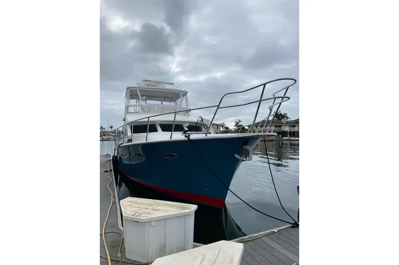  Yacht Photos Pics 2012 Mikelson 43 Sportfisher yacht docked on a cloudy day.