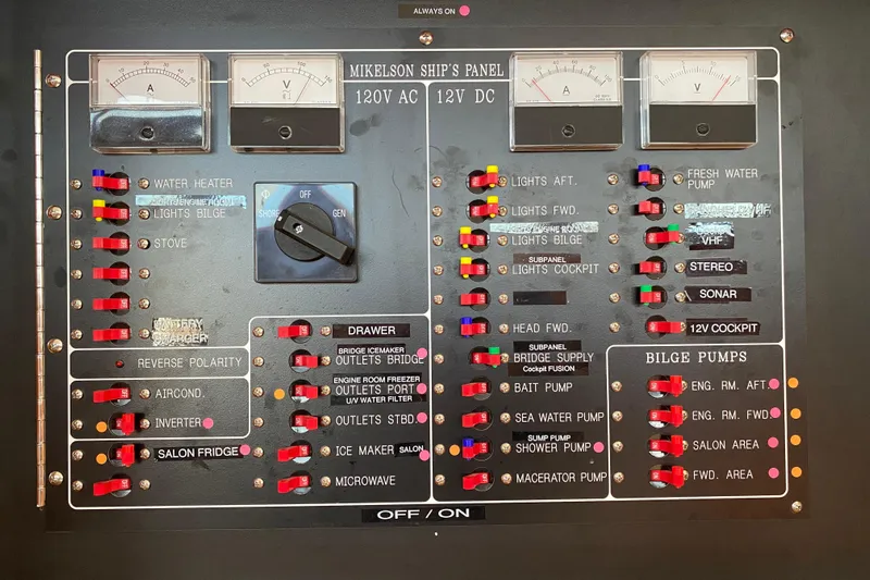  Yacht Photos Pics Control panel of a 2012 Mikelson 43 Sportfisher with switches and gauges.