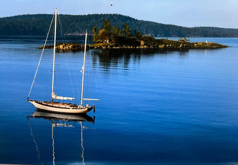 "warm Rain Ii" Yacht Photos Pics Sailboat on calm water near an island, Custom Bruce King model, 1992.