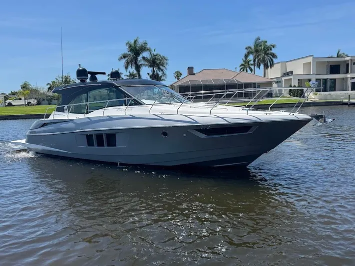  Yacht Photos Pics 2014 Cruisers Yachts 45 Cantius Black Diamond on water, with modern design and sleek lines.