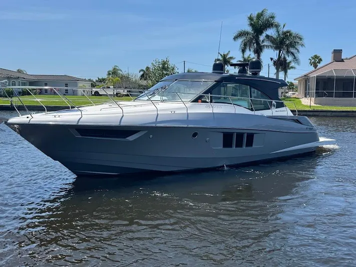  Yacht Photos Pics 2014 Cruisers Yachts 45 Cantius Black Diamond on a sunny waterway.