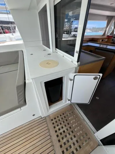 Kajsa Yacht Photos Pics 2017 Lagoon 450 F yacht interior with open storage compartment and modern design.
