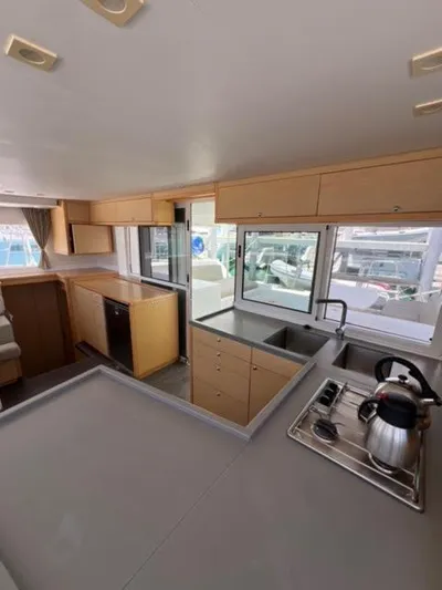 Kajsa Yacht Photos Pics Interior of 2017 Lagoon 450 F catamaran with modern kitchen and ample natural light.