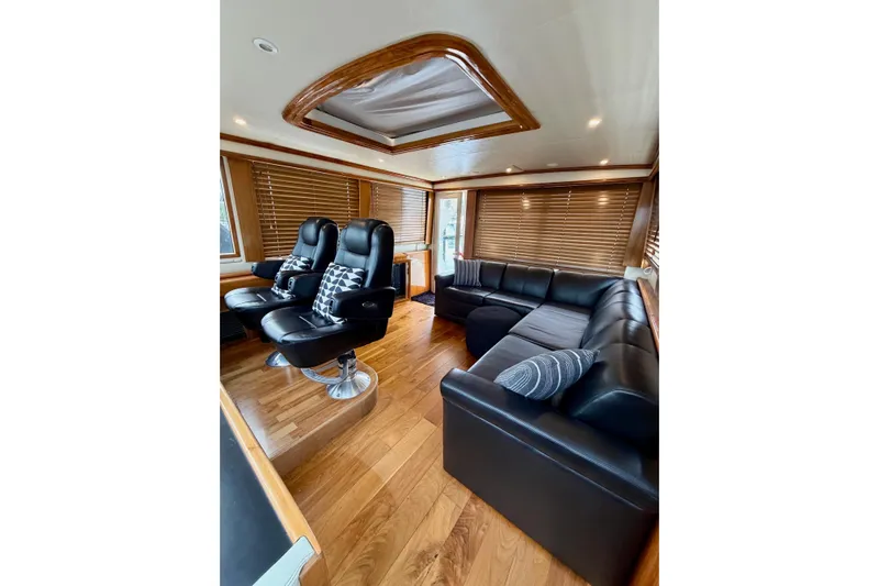  Yacht Photos Pics Luxurious interior of 2009 Navigator California 50 Veneti yacht with leather seating and wood accents.