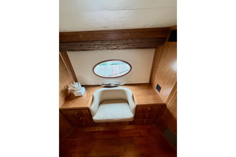  Yacht Photos Pics Luxurious interior of 2009 Navigator California 50 Veneti yacht with elegant seating and wood finish.