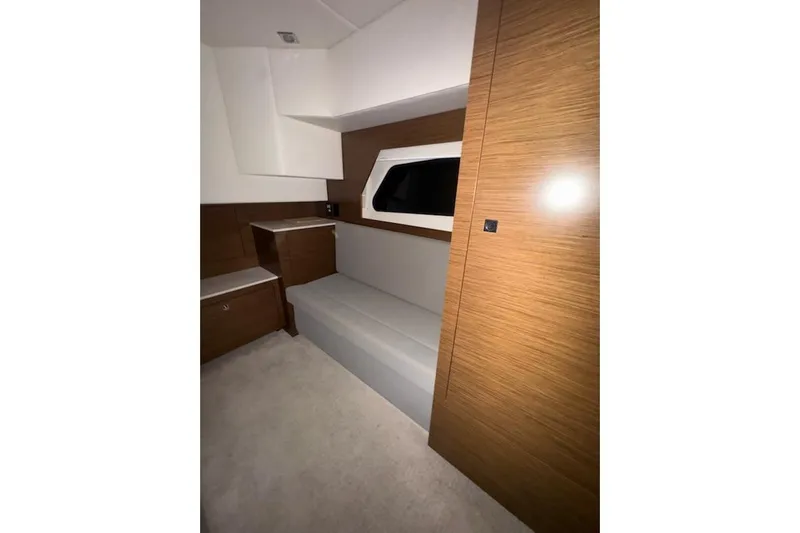 Branch Office Yacht Photos Pics 2016 Cruisers 390 Express interior with modern wood finish and seating area.