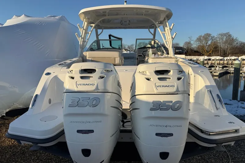  Yacht Photos Pics 2017 Boston Whaler 320 Vantage with dual Verado 350 engines at a marina.